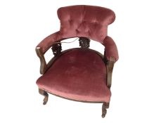 A 19th century mahogany open armchair in pink buttoned dralon