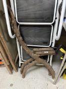 A pair of antique cast iron bench ends