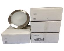 A set of four circular chrome ceiling lights with opaque glass shades, boxed.