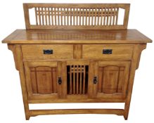 An oak Arts and Crafts style sideboard