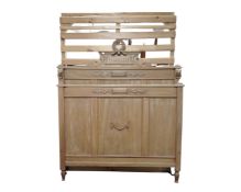 An antique French pine 4' bed frame