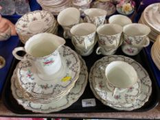 An antique 34 piece Queens china tea service.