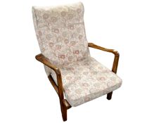 A mid century fireside chair