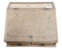 An antique pine clerk's desk