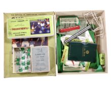 A vintage Subbuteo table soccer set together with a floodlight set and a table cricketer fielders