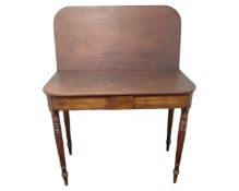 A 19th century inlaid mahogany tea table