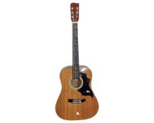 A six string acoustic guitar.