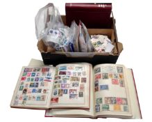 A box containing stamp albums and a large quantity of loose antique and later world stamps.