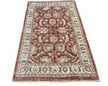 A Zeigler design rug, 124cm by 193cm.