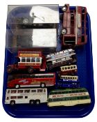 A tray containing die cast busses trams and coaches together with two Atlas Edition military