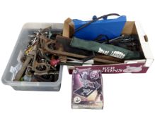 A box and a crate containing assorted hand tools, hand saws, measures, a gas stove,
