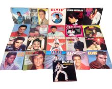 A collection of 21 Elvis Presley vinyl LPs.