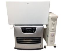 A Zibro room heater together with a further panel heater and an oil filled radiator.