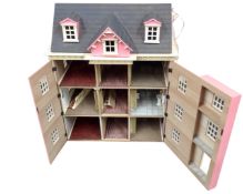 A Georgian style doll's house together with a box of doll's furniture and dolls