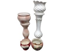 Four jardinières, two on stands.