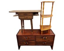 An oak side table, a pine corner whatnot and a stained pine low table fitted with four drawers.