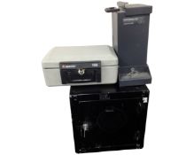 A Burton Safes note and cash box, a Sentry 1100 cash box and a metal cabinet, all with keys.