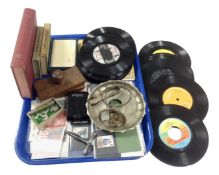 A tray containing Observer books, a small quantity of vinyl 7