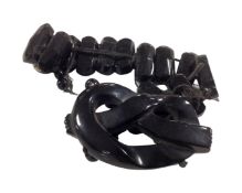 A Whitby Jet bracelet.