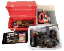 A tool box and two plastic crates containing assorted hand tools, power tools, bench vice,