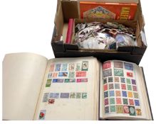 A box containing stamp albums together with a quantity of loose antique and later worlds tamps.