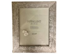 One crate containing thirty large Fotolijst silver wood finish 20 cm x 25 cm photo frames,