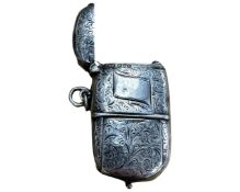 A silver combination vesta / sovereign case, with internal pencil, Chester 1905.