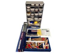 Boxes and a multi-drawer chest containing Meccano parts together with Meccano magazines and