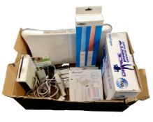 A Nintendo Wii with Wii Sports, leads, Wii Fit board, controller and assorted accessory packs.
