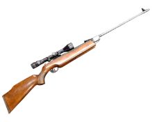 A German Weihrauch HW80 .22 caliber air rifle with a Tasco 4x40 Supercon scope.