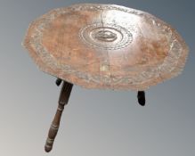A 19th century carved oak table on tripod base (a/f)