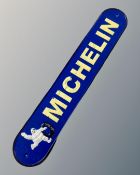 A cast iron Michelin wall plaque.