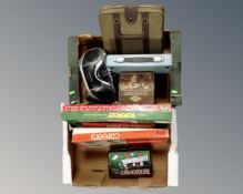 Two boxes containing vintage board games, typewriters, ice cream maker, Alba CD player.