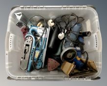 A box containing power tools including Makita belt sander, Bosch angle grinder,