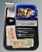 A tray containing assorted bank notes, coinage,