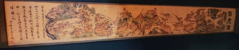 An elaborate Chinese scroll depicting dragons, 239cm by 31cm.