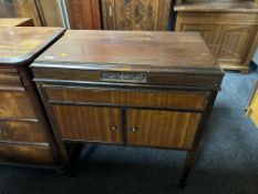 A mahogany cased Selecta radiogram together with a small quantity of vinyl 78s.