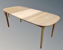 A Mobil Furniture Haslev extending table with leaf.
