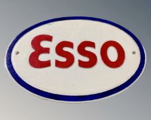 A cast iron Esso wall plaque.