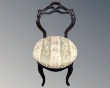 A late 19th century painted bedroom chair.