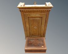 An antique hand painted wall cabinet with gilt metal mounts,