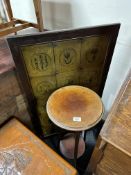 A Danish hand painted wood framed fire screen together with a mahogany two tier plant stand.