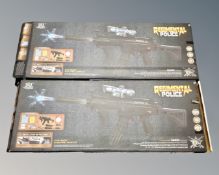 Two Regimental Police SMG9 electric dartle guns.