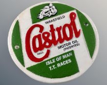 A cast iron Castrol motor oil wall plaque.