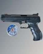A Beeman P17 air pistol with tin of pellets.