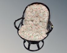 A painted bamboo and wicker conservatory armchair