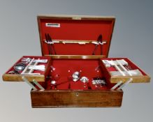 A Meridional mahogany canteen of Inox cutlery