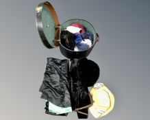 A vintage hat box, hats, material,