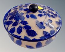 A decorative pink and blue glass lidded tureen on ball feet,