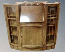 A 1930's oak side by side bureau bookcase